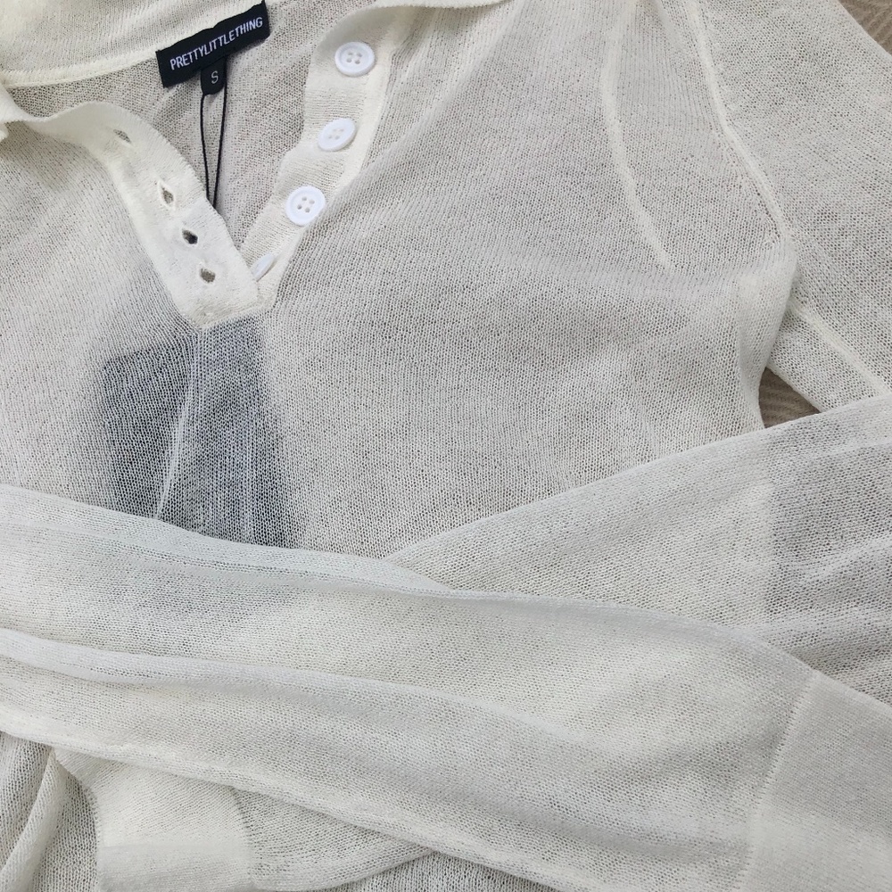 Cream buttoned top